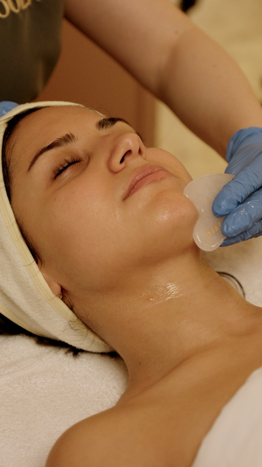 Gua sha facial massage at Toula